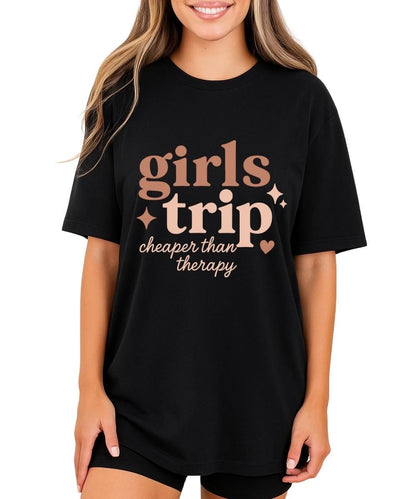Black girls trip t-shirt with retro text reading “girls trip cheaper than therapy” and sparkle accents