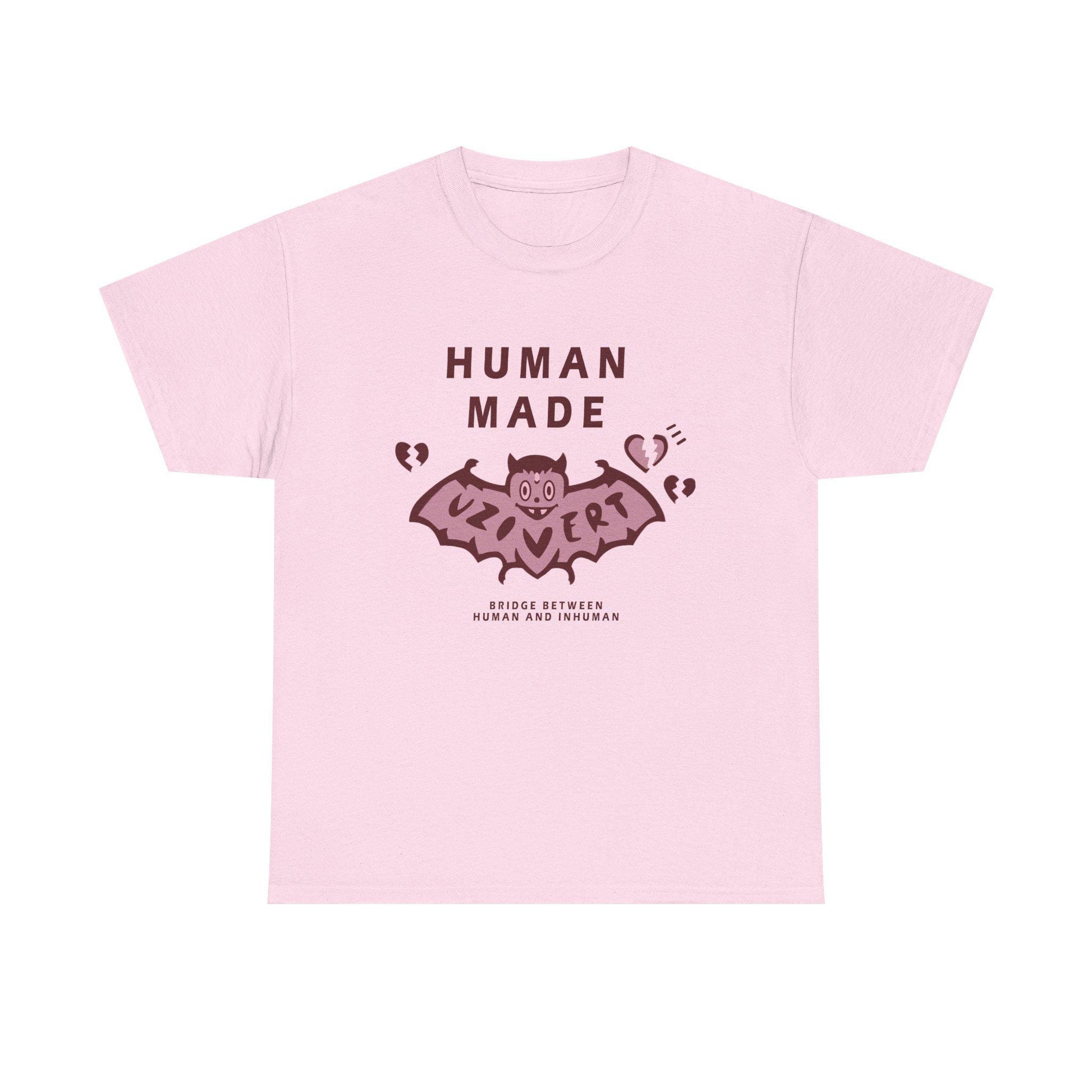 Lil Uzi Vert Shirt – light pink graphic tee with Human Made bat design, broken hearts, and Bridge Between Human and Inhuman text